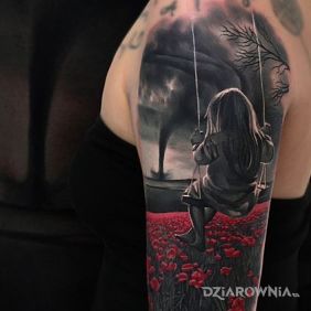 Dziewczynka pośród czerwonych maków