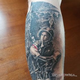 Mały powstaniec na gruzach Warszawy