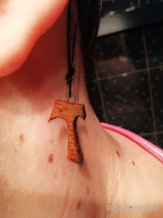 Tatuaż tauka - religijne