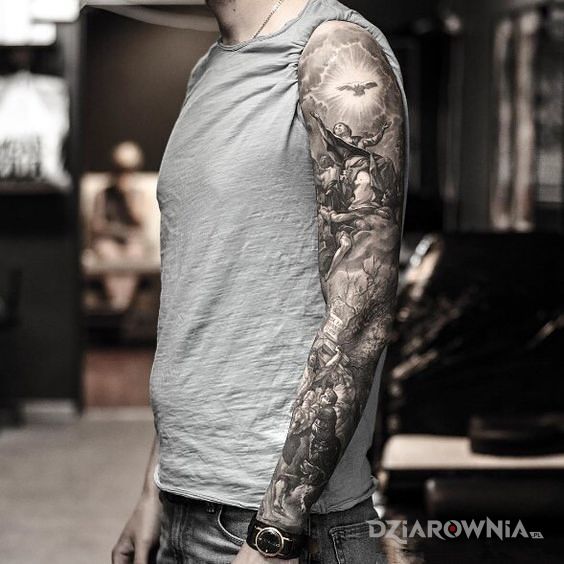 Tatuaż mocny rękaw - religijne