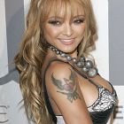 Tila Tequila - serce ze skrzydłami i karabinami