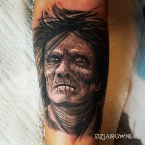Tatuaż jakiś stwór - twarze